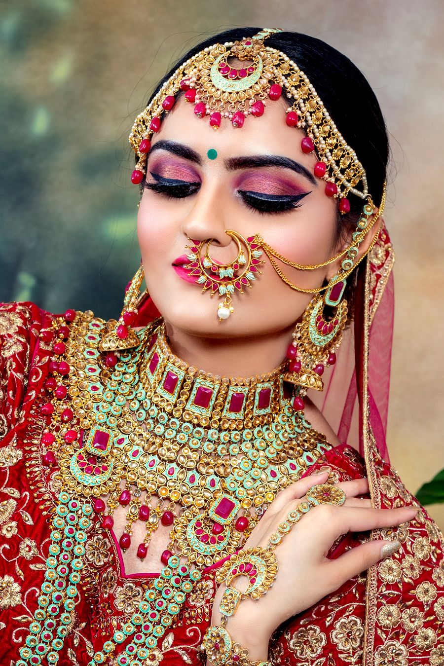Bride in traditional attire with bridal makeup and jewellery