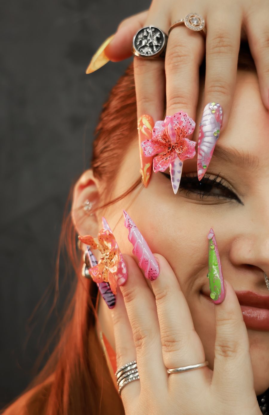 Colourful, detailed nail art design close-up